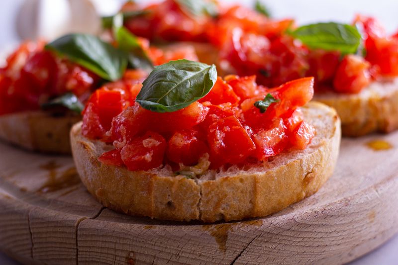 Classic bruschetta starter with tomato and fresh basil